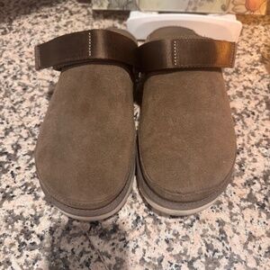 Brown Uggs golden star